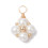 Pendentif fleur tissée en nacre