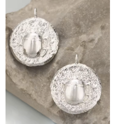 Pendentif oeil articulé + zircon vert