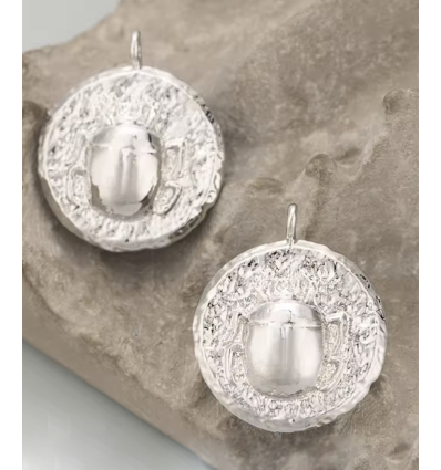 Pendentif oeil articulé + zircon vert