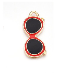 Pendentif oeil articulé + zircon vert
