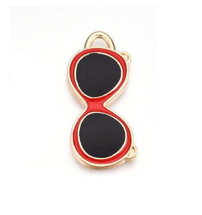 Pendentif oeil articulé + zircon vert