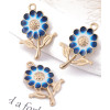 Pendentif oeil articulé + zircon vert