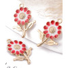 Pendentif fleur sur tige