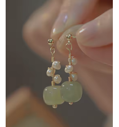 clou d'oreille avec boule en acier