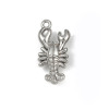 Pendentif oeil articulé + zircon vert
