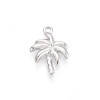Pendentif oeil articulé + zircon vert