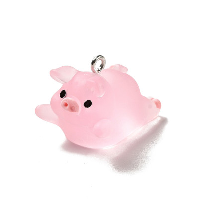 Pendentif petit cochon qui vole en résine