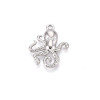 Pendentif oeil articulé + zircon vert