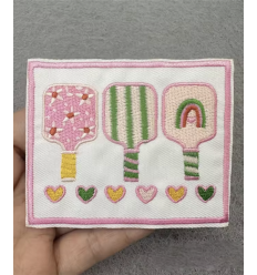 Ecusson patch rectangle "3 raquettes"