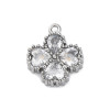 Pendentif oeil articulé + zircon vert