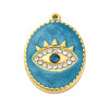 Pendentif oeil articulé + zircon vert