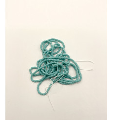 Rocaille tube facette turquoise opaque sur fil
