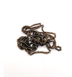 Rocaille diamantée marron foncé sur argent 10/o sur fil